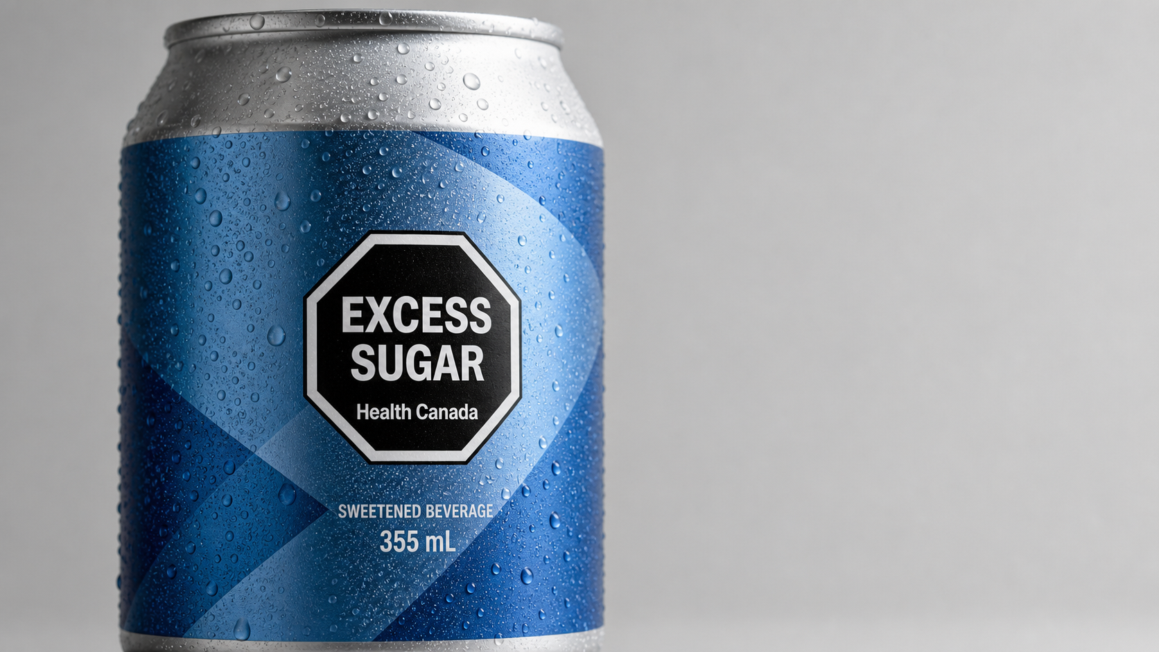 Close-up of canned drink front label with compliance warning symbol applied