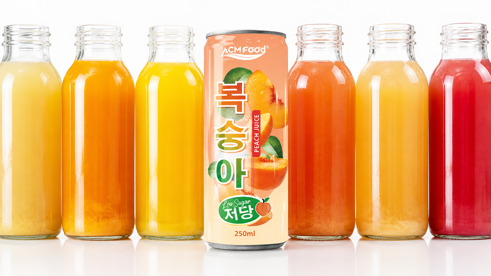 Close-up of fruit juice color and cloud stability comparison in clear bottles