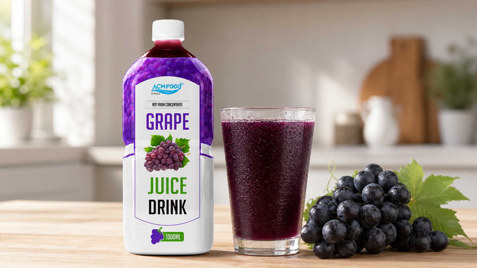 Glass of purple grape juice beside fresh black grapes on a table