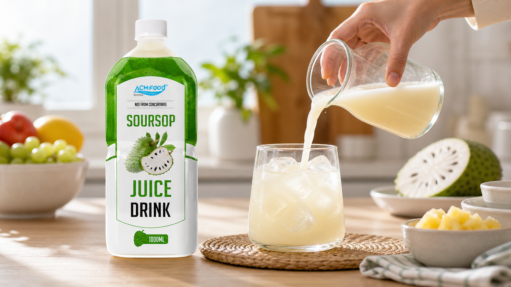 Hand pouring soursop juice over ice in a bright breakfast kitchen scene