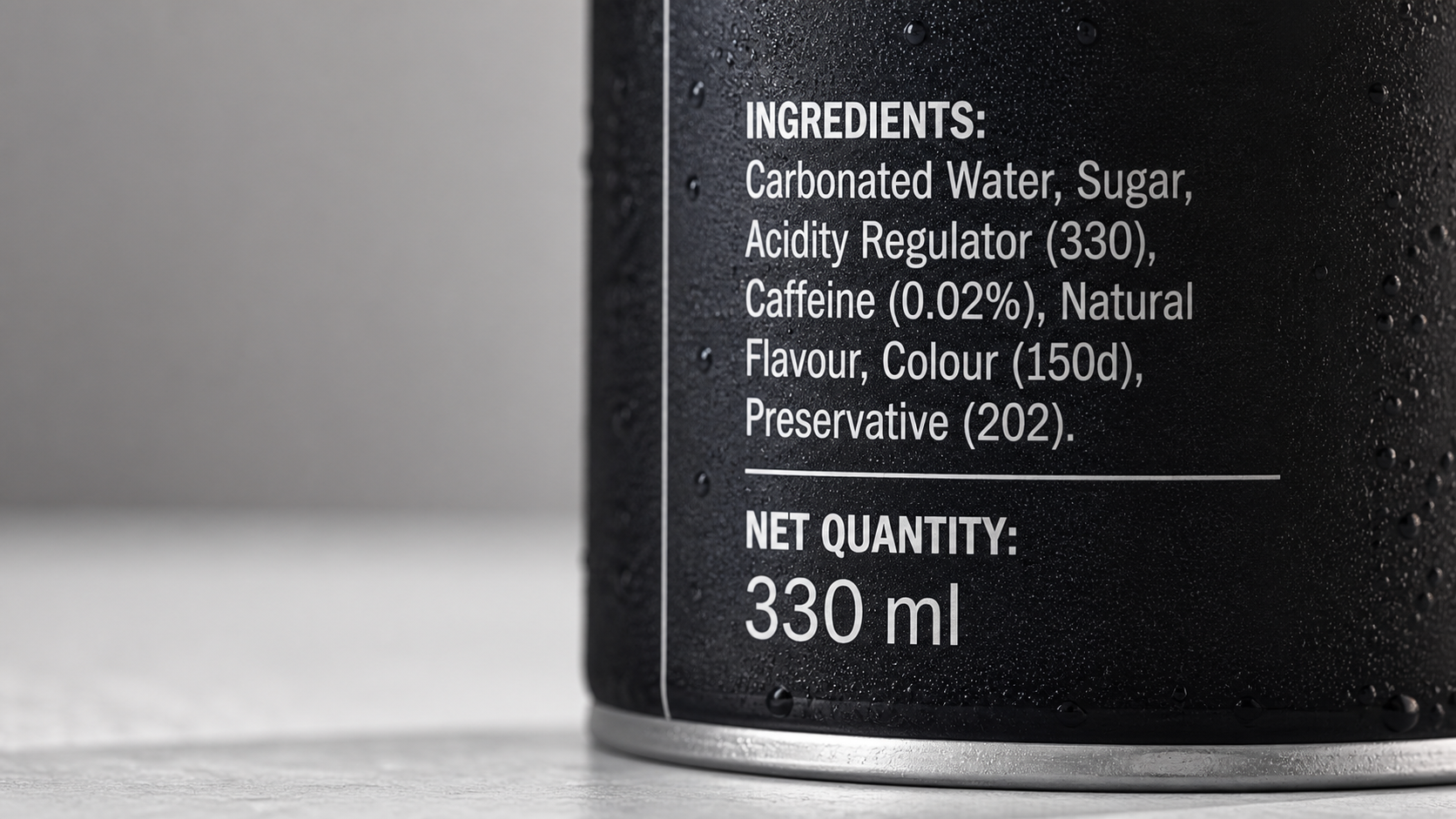 Close-up of beverage can with compliant net quantity and ingredient statement